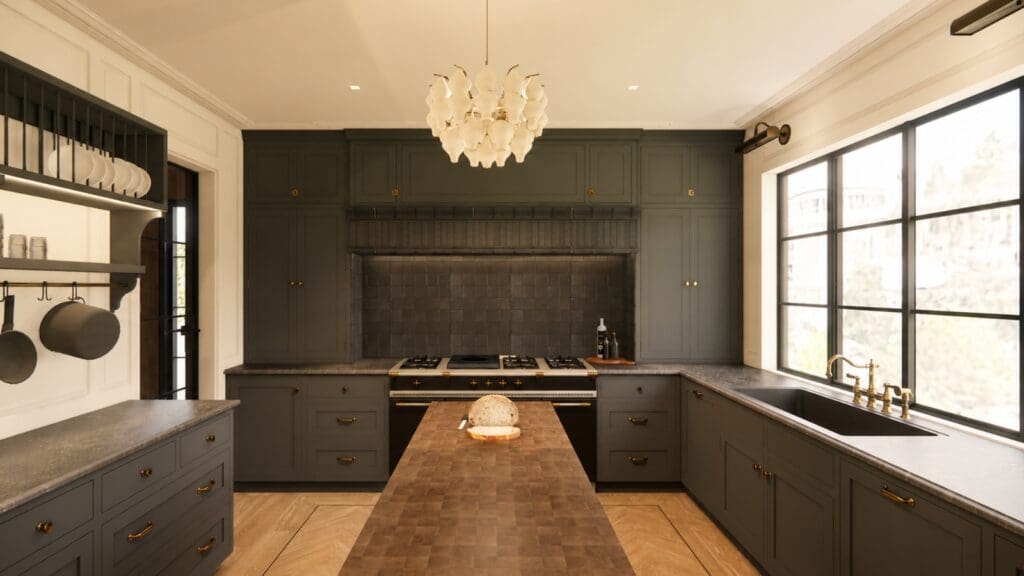Charcoal cabinetry and a butcher block island running to the range in a 1930 Los Feliz Spanish Revival estate kitchen, design rendering by The Warren.